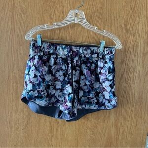 Lululemon reversible shorts. Purple and blue floral and gray